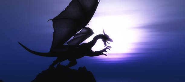 dragon silhouetted against a purple sky